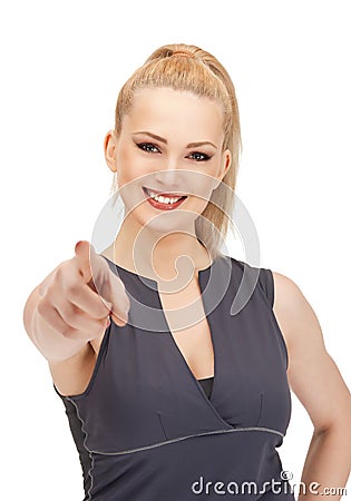 Lovely fitness instructor pointing her finger Stock Photo