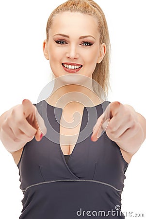 Lovely fitness instructor pointing her finger Stock Photo