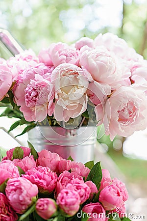 Lovely flowers in glass vase. Beautiful bouquet of pink peonies . Floral composition, scene, daylight. Wallpaper Stock Photo