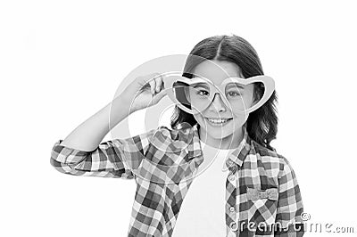 Lovely glance. Kid girl heart shaped eyeglasses cheerful. Girl curly hairstyle adorable smiling face. Child charming Stock Photo