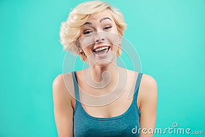 Lovely hipster girl with short fair hair having fun. Stock Photo