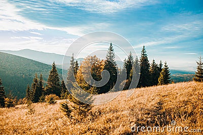 Lovely horizontal shot of the rising sun and high mountains Stock Photo