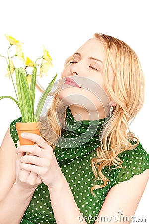Lovely housewife with flower Stock Photo