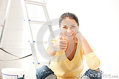 Lovely housewife making repairing works Stock Photo