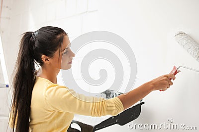 Lovely housewife painting Stock Photo