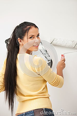 Lovely housewife painting Stock Photo