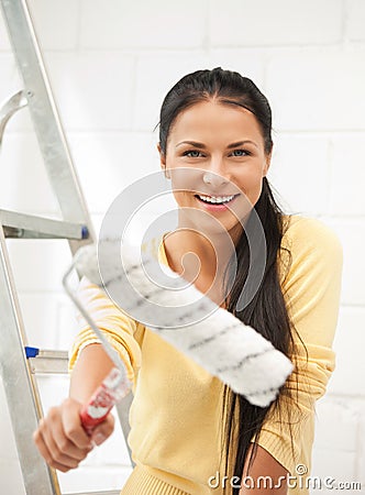 Lovely housewife painting Stock Photo