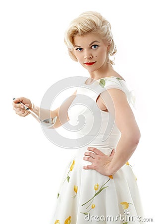 Lovely housewife with scoop Stock Photo