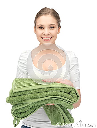 Lovely housewife with towels Stock Photo