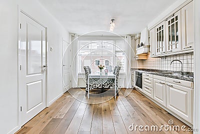 Lovely large kitchen with a large window Stock Photo