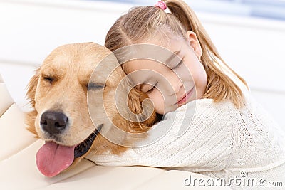 Lovely little girl and her pet dog Stock Photo