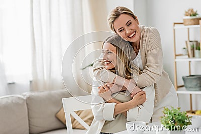 lovely pretty sisters in trendy attire Stock Photo