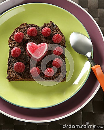 Lovely raspberryes and heart cake Stock Photo