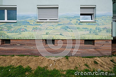 lovely rural German landscape mural streetart painting on a high-rise building in silicate paint, in Langen from a large facade Editorial Stock Photo