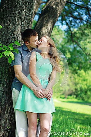 Lovely sensual couple in love enjoying kiss outdoors Stock Photo