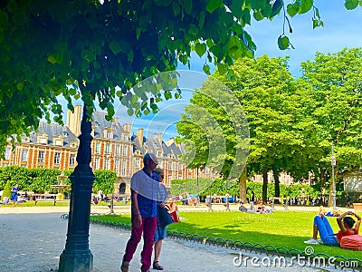 A beautiful relaxing square of Place des Vosges in Paris Editorial Stock Photo