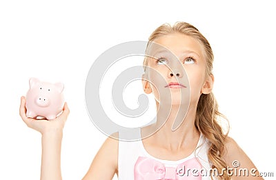 Lovely teenage girl with piggy bank Stock Photo