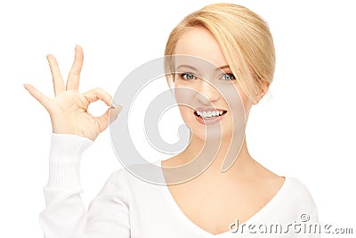 Lovely teenage girl showing ok sign Stock Photo