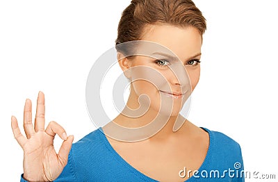 Lovely teenage girl showing ok sign Stock Photo