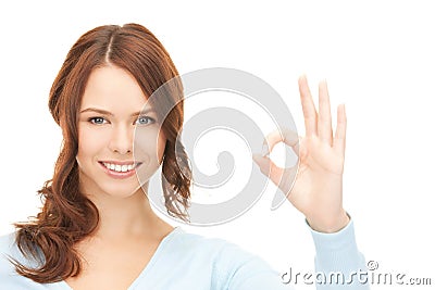Lovely teenage girl showing ok sign Stock Photo