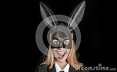 Lovely woman in rabbit costume. Sexy model dressed in costume Easter bunny. Woman rabbit easter bunny girl. Happy woman Stock Photo