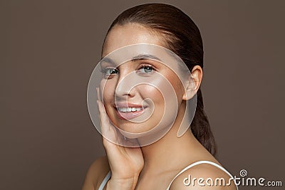 Lovely young woman spa model face closeup. Facial treatment, skin care, cosmetology, beauty and spa concept Stock Photo