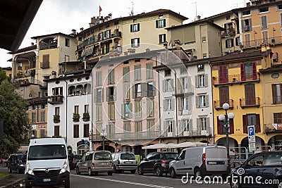 Lovere, Italy - June 28, 2017: Beautiful facades of houses in the old Italian town, houses with tiled roofs Editorial Stock Photo