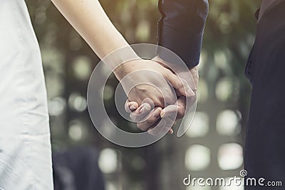 Lovers couple holding hands, love and romance concept Stock Photo