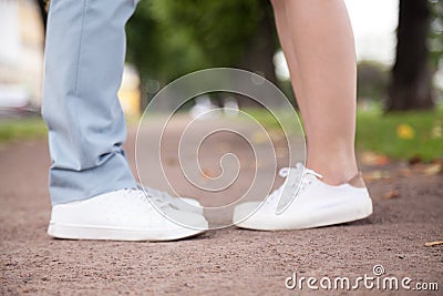 Lovers on romantic date, close up of legs Stock Photo