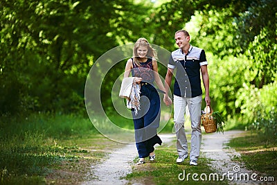 Lovers walking in forest Stock Photo