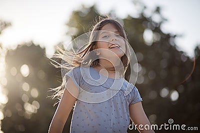 Little girl spending time at nature Stock Photo