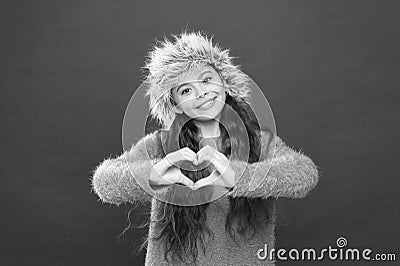 She loves winter weather. seasonal health care. kid fashion. Warm clothes and accessory tips. happy little girl in Stock Photo