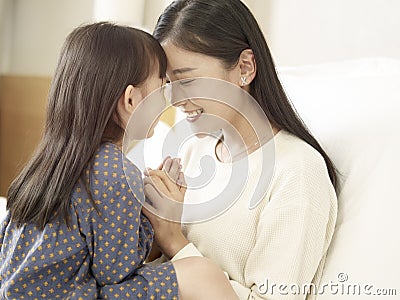 Loving asian mother and daughter Stock Photo