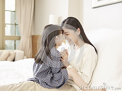 Loving asian mother and daughter Stock Photo