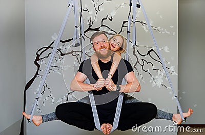 Loving couple doing yoga together. Pair exercise. Healthy lifestyle, healthy hobby Stock Photo