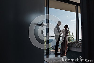 Happy young couple spends their honeymoon in a beautiful hotel traveling around Europe Stock Photo