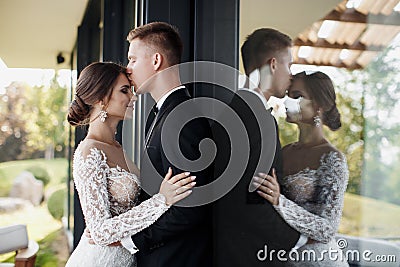 Happy young couple spends their honeymoon in a beautiful hotel traveling around Europe Stock Photo