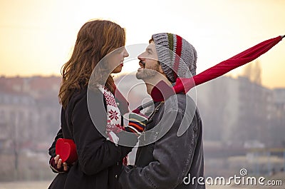 Loving couple looking at each others eyes outdoors Stock Photo