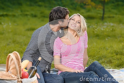 Loving couple in park. Loving young couple having a great time t Stock Photo