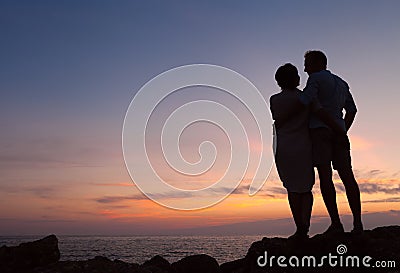 Loving couple sunset silhouette Stock Photo