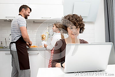 Loving Family Spending Morning in Kitchen Stock Photo