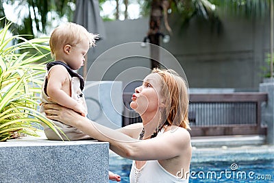 Loving mom plays with her son Stock Photo