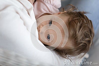 Loving mother breastfeed small newborn baby daughter Stock Photo