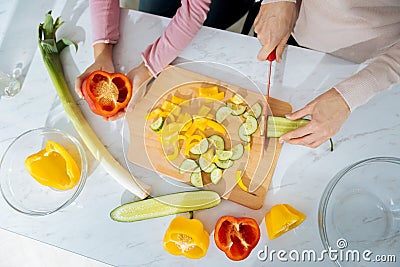 Loving mother and daughter cooking in the kitchen Stock Photo