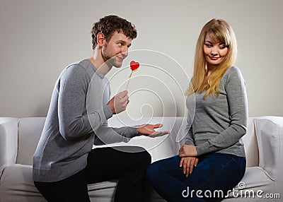 Loving pare with heart flirting. Stock Photo