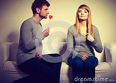 Loving pare with heart flirting. Stock Photo