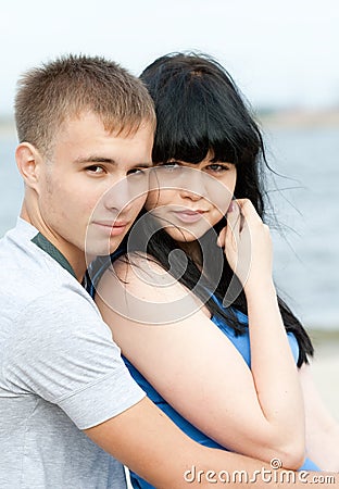 Loving young couple is embracing Stock Photo