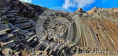 Low angle panoramic shot of prismatic disjunction in Porto Santo island in Madeira Stock Photo