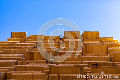 Wood planks stacked in sawmill yard Stock Photo