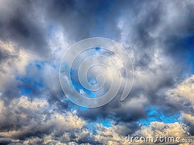 Low angle shot of a heavily clouded dramatic sky on a rainy stormy day Stock Photo